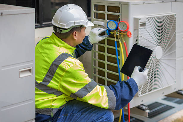 Professional Air Duct Cleaning technician working in Jefferson, NC